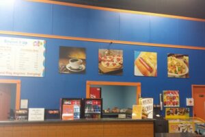 We offer coffee, nachos, hot dogs and many other snacks and drinks. We also carry a full menu including pizza, fries, salads, sub platters and more ( some kosher options may be available).